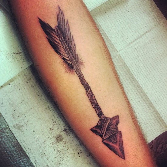 Amazing Tribal Arrow Tattoo On Forearm