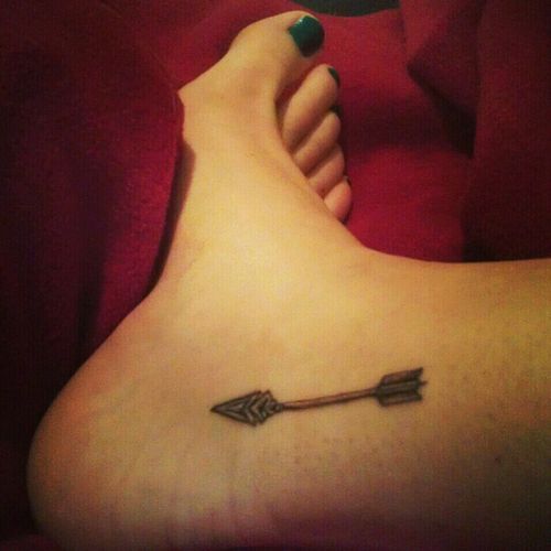 Amazingly Designed Arrow Tattoo On Foot