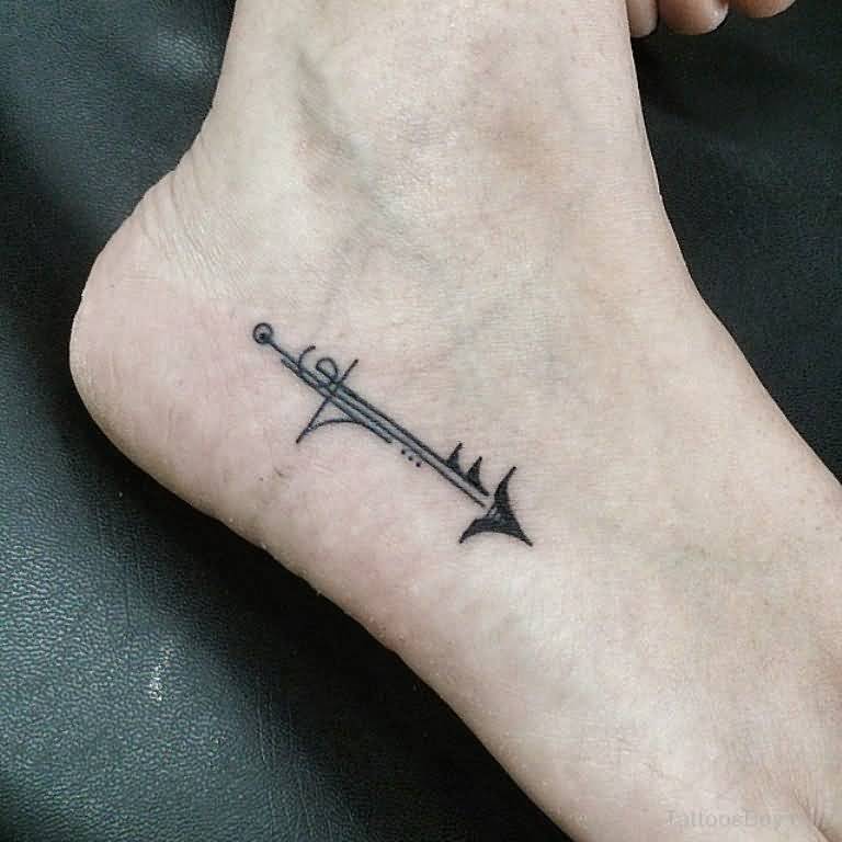 Amazingly Designed Black Arrow Tattoo On Foot