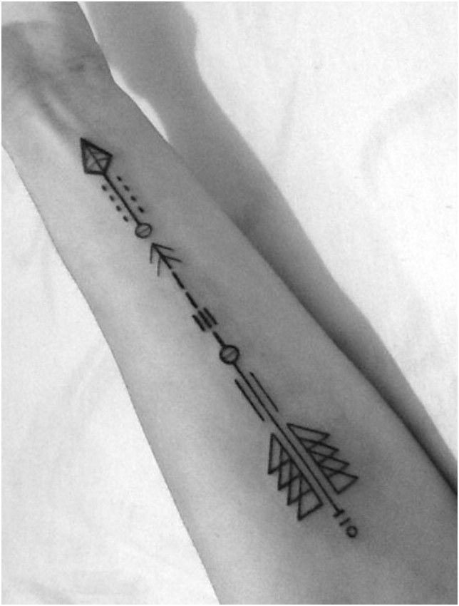 Arrow In Traditional Design Tattoo On Arm