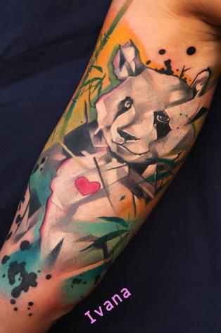 Awesome Panda Bear With Small Heart Tattoo On Half Sleeve