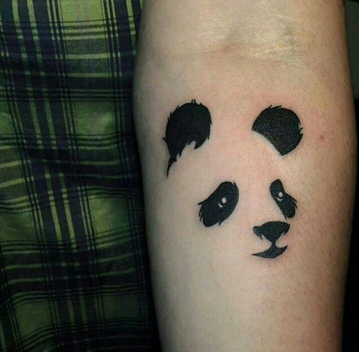 Awesome Panda Cub Face Tattoo On Forearm