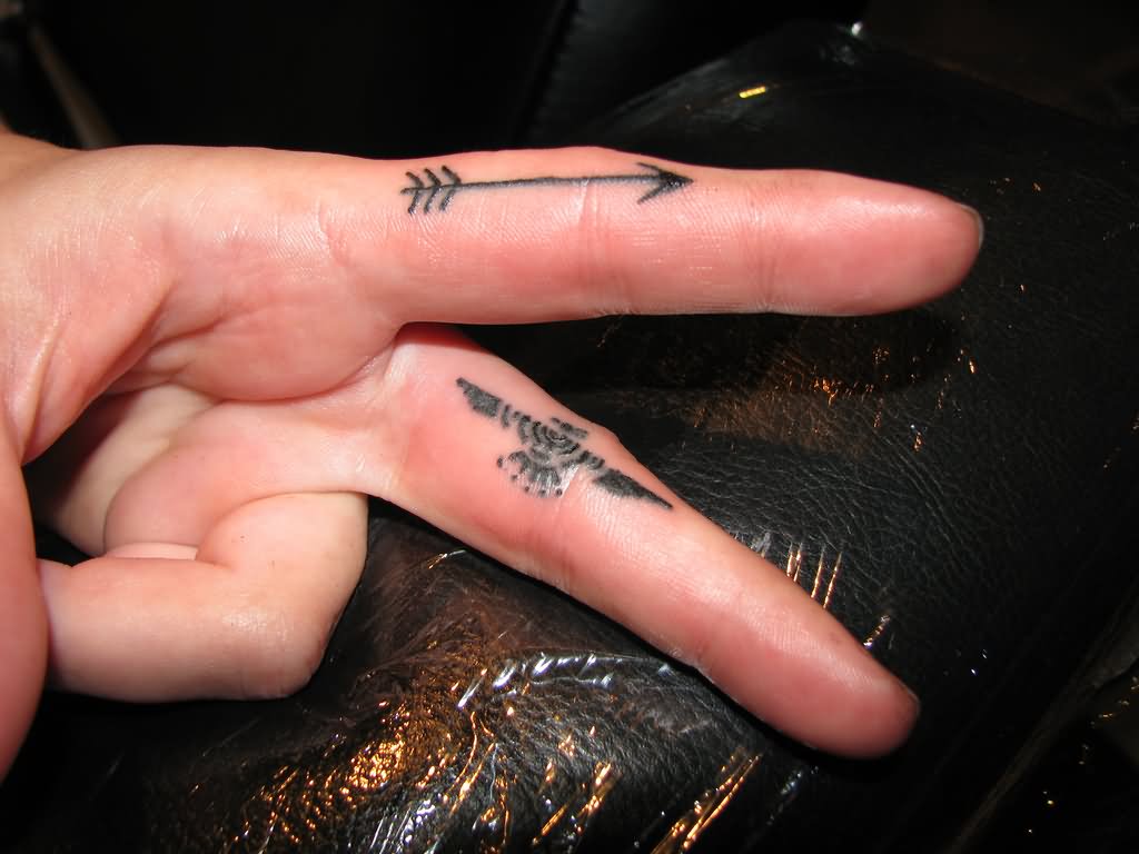 Aztec Eagle And Arrow Tattoos On Two Fingers