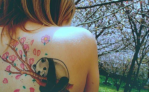 Beautiful Panda On Blossom Branch Tree Tattoo On Upper Back
