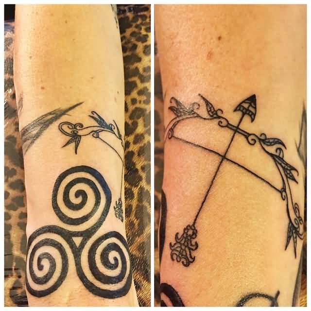 Beautiful Vintage Bow And Arrow On Forearms