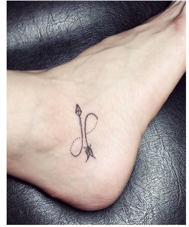 Beautiful infinity Arrow Tattoo On Foot