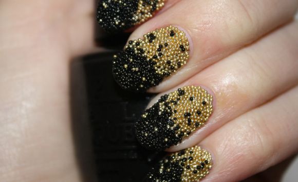 Black And Gold Caviar Nail Design