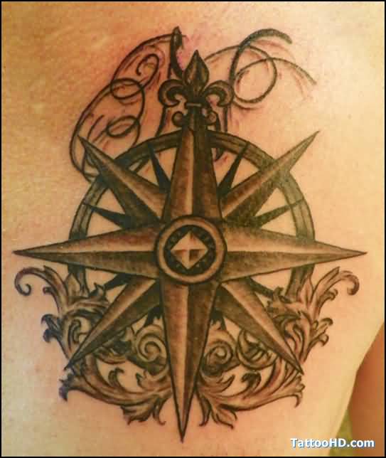 Black And Grey Compass Tattoo On Man Chest