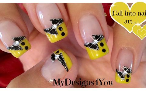 Black And Yellow French Tip Nail Art With Bow Design