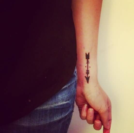 Black Arrow In Beautiful Shape Tattoo On Wrist