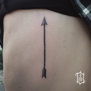 Black Arrow Tattoo On Rib