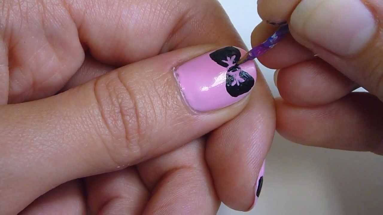 Black Bow On Pink Nail Idea