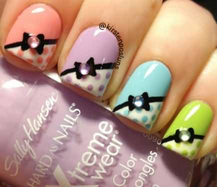 Black Bows On Multicolored Nails With Rhinestones