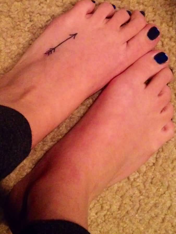 Black Inked Arrow Tattoo On Foot