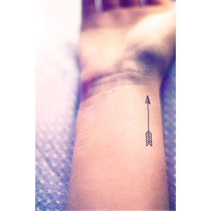 Black Inked Tiny Arrow Tattoo on Wrist