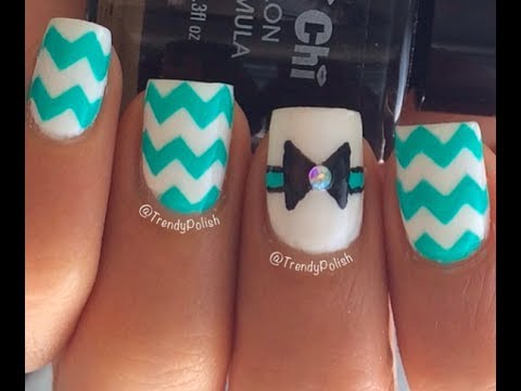 Blue And White Chevron Nail Art With Black Bow