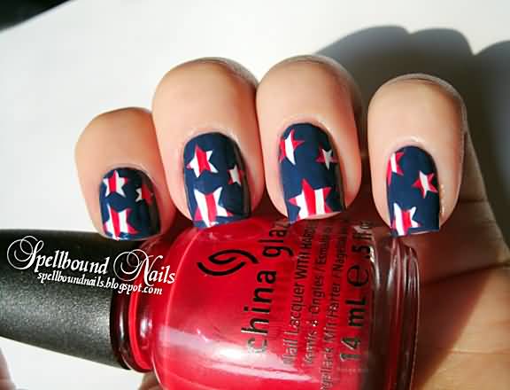 Blue Base Nails With White And Red Stars Fourth Of July Nail Art