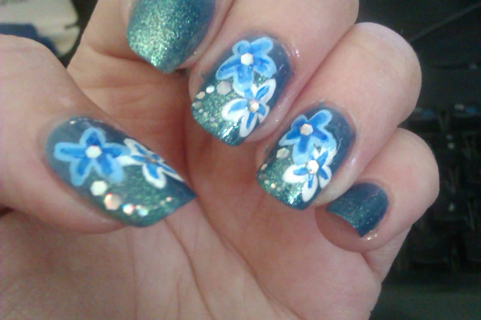 Blue Flower Nail Art On Glitter Nails