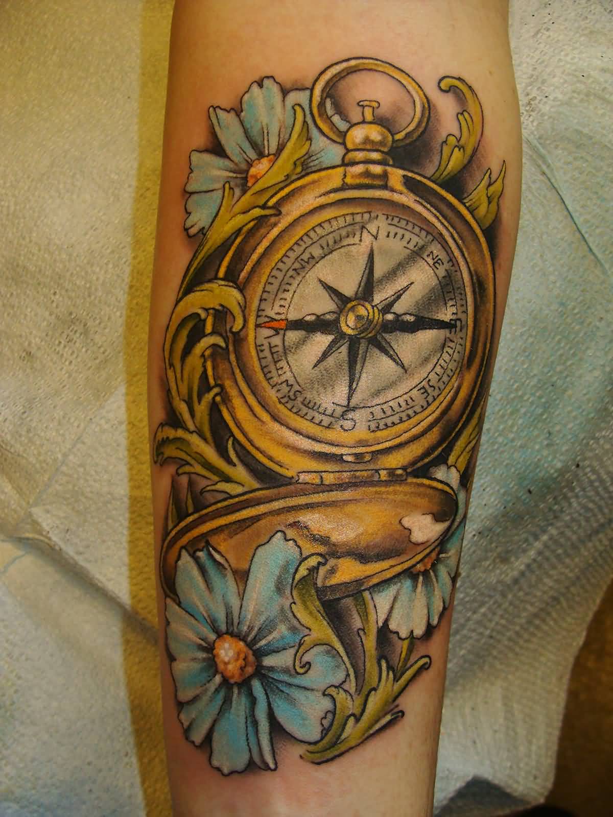 Blue Flowers And Compass Tattoo On Arm Sleeve