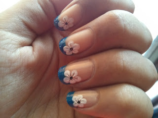Blue Glitter French Tip Nail Art With White Flowers Design
