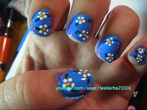 Blue Nails With Acrylic White Flower Nail Art