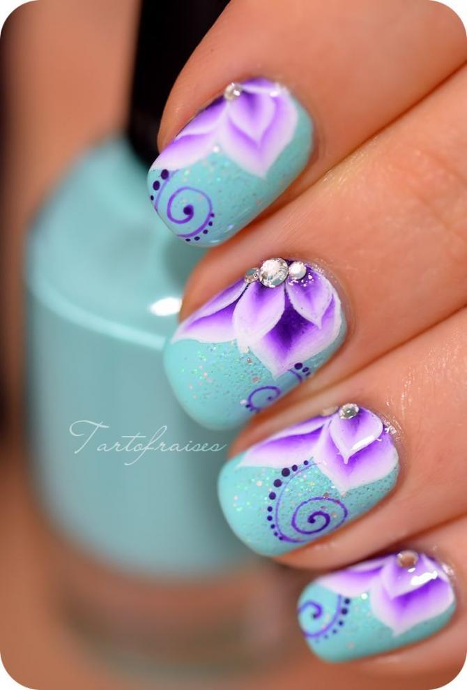 Blue Nails With Purple Flower Nail Art