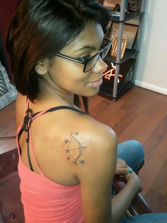 Bow And Arrow With Stars Tattoo On Right Shoulder