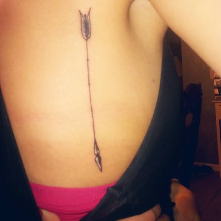 Breathtaking Arrow Tattoo On Rib For Women
