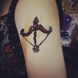 Breathtaking Bow And Arrows Tattoo On Left Shoulder