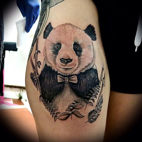 Brilliant Large Panda Wearing Bow With Bamboos Tattoo On Half Sleeve
