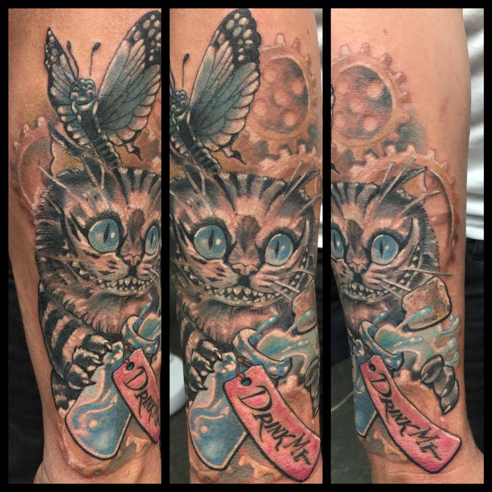 Cheshire Cat Tattoo On Forearm by Levi Bell