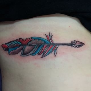 Colorful Arrow Tattoo On Rib