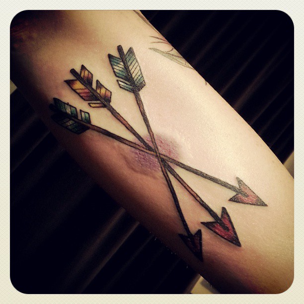 Colorful Arrows Tattoo On Arm