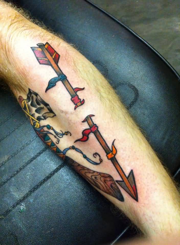 Colorful Traditional Arrow Ripped Skin Tattoo On Forearm