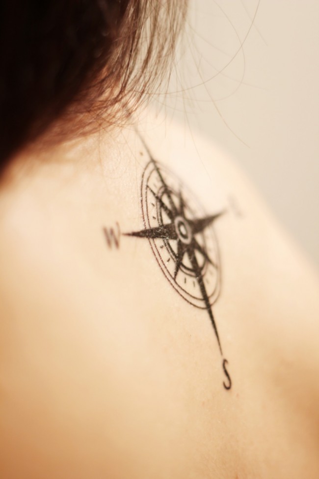 Compass Tattoo On Girl Upper Back