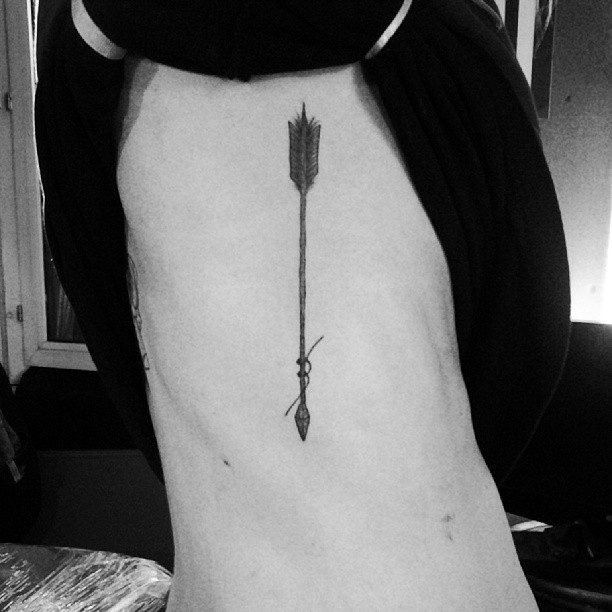 Cool Arrow Tattoo On Rib For Men