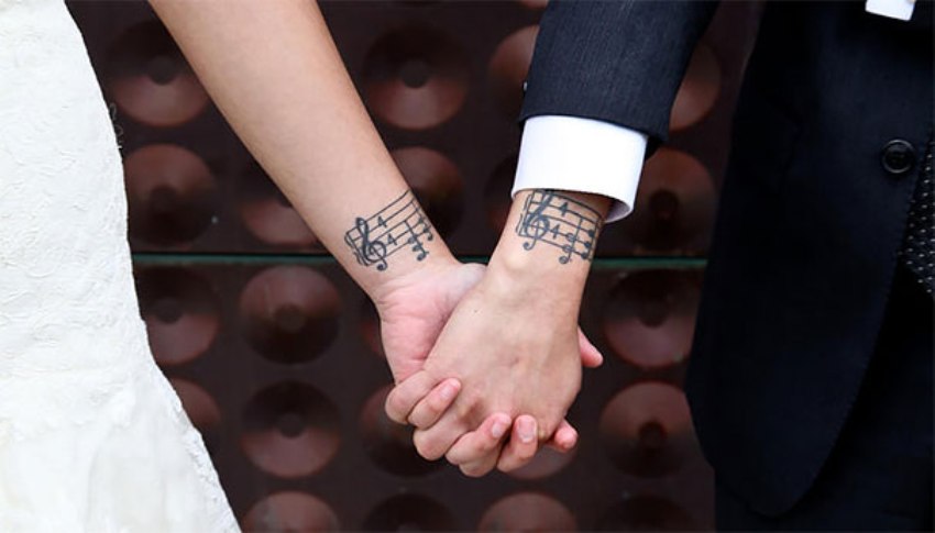 Cool Music Notes Tattoo On Couple Wrists