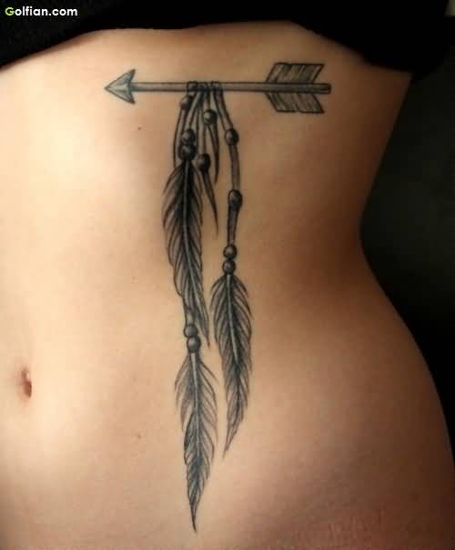 Cool Traditional Arrow With Feather Tattoo On Rib