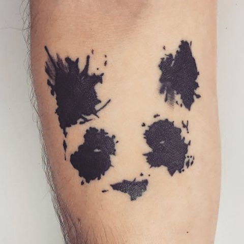 Creative Panda Face Tattoo On Forearm