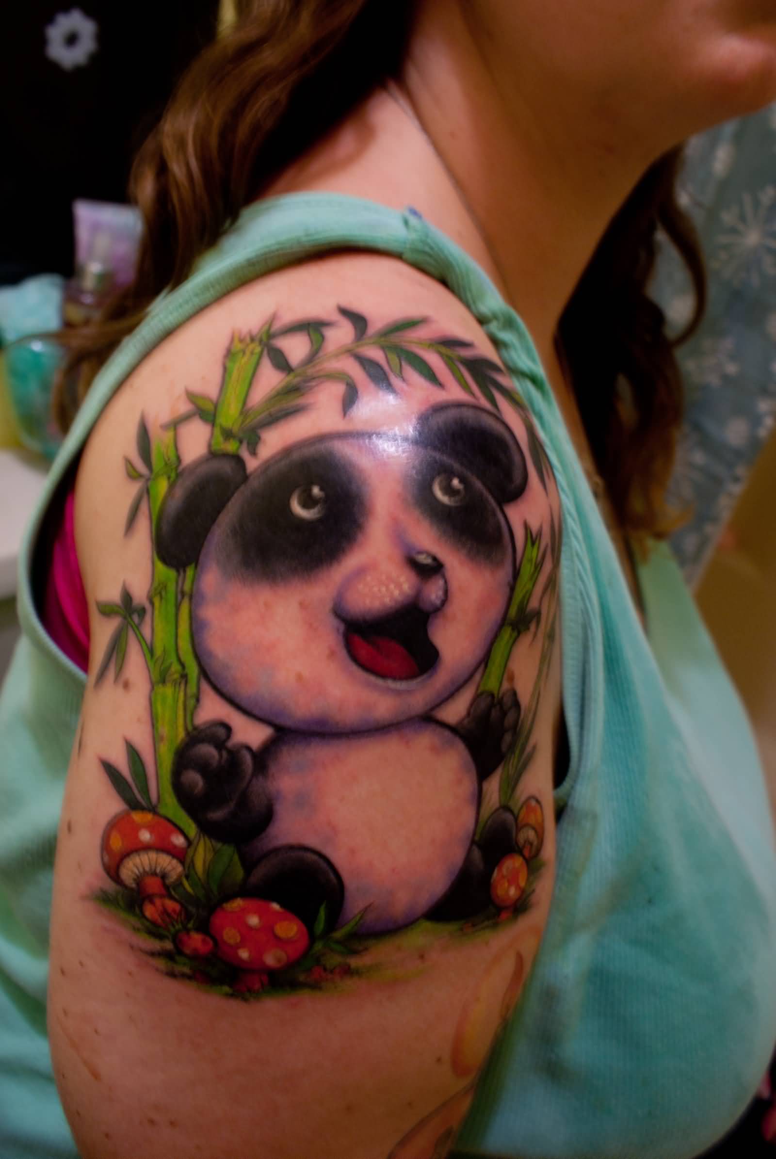 Cute Baby Panda With Green Bamboos Tattoo On Right Shoulder