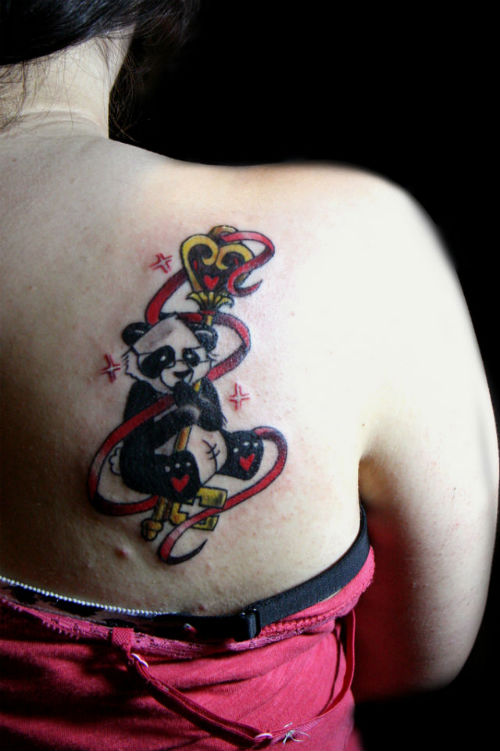 Cute Panda With Crown Headed Key Tattoo On Back Side