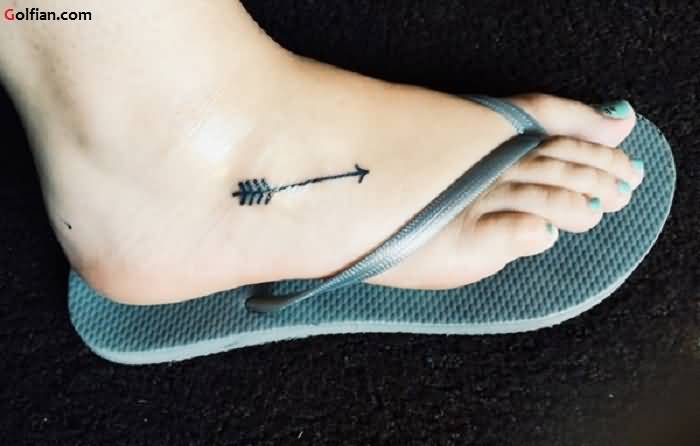 Dark Black Ink Arrow Tattoo On Foot