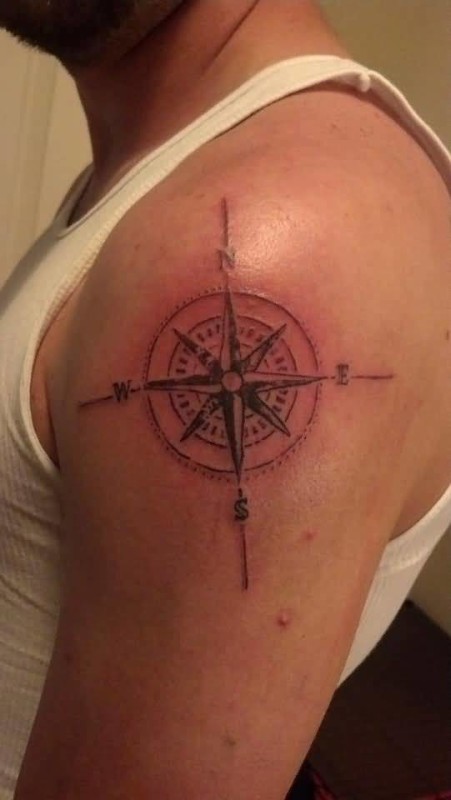 Feminine Compass Tattoo On Man Left Shoulder