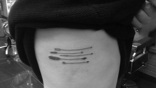 Five Small Arrows Tattoo On Rib For Women