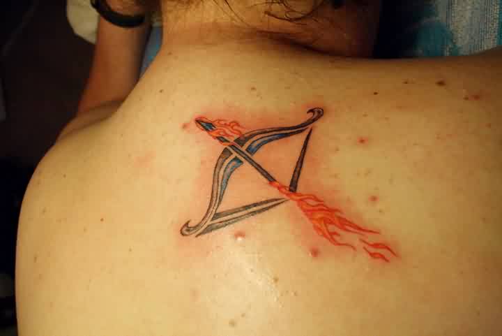 Flaming Bow And Arrow Tattoo On Nape For Women