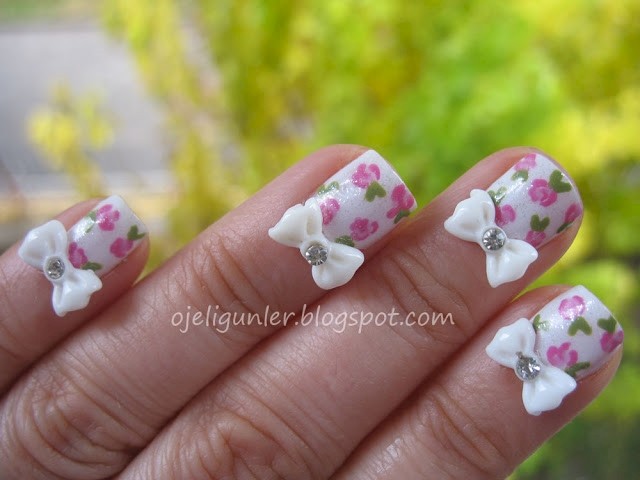 Floral Nails And White 3d Bows Nail Art Design