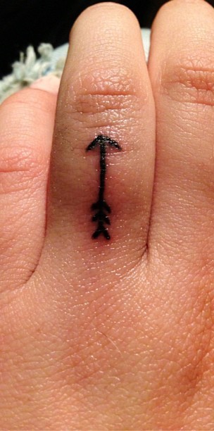 Fresh Ink Arrow Tattoo On Finger