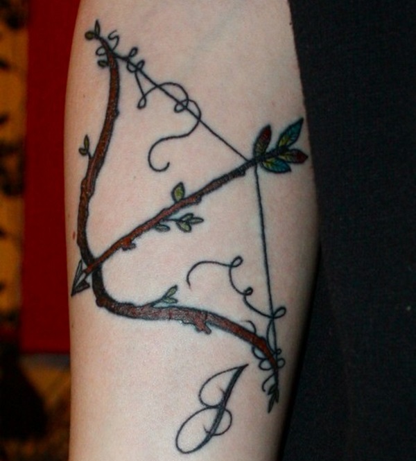 Gorgeous Bow And Arrow Tattoo On Arm