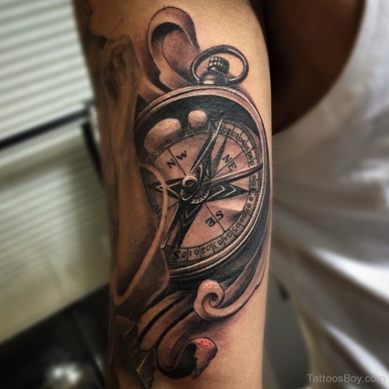 Grey Compass Tattoo On Bicep