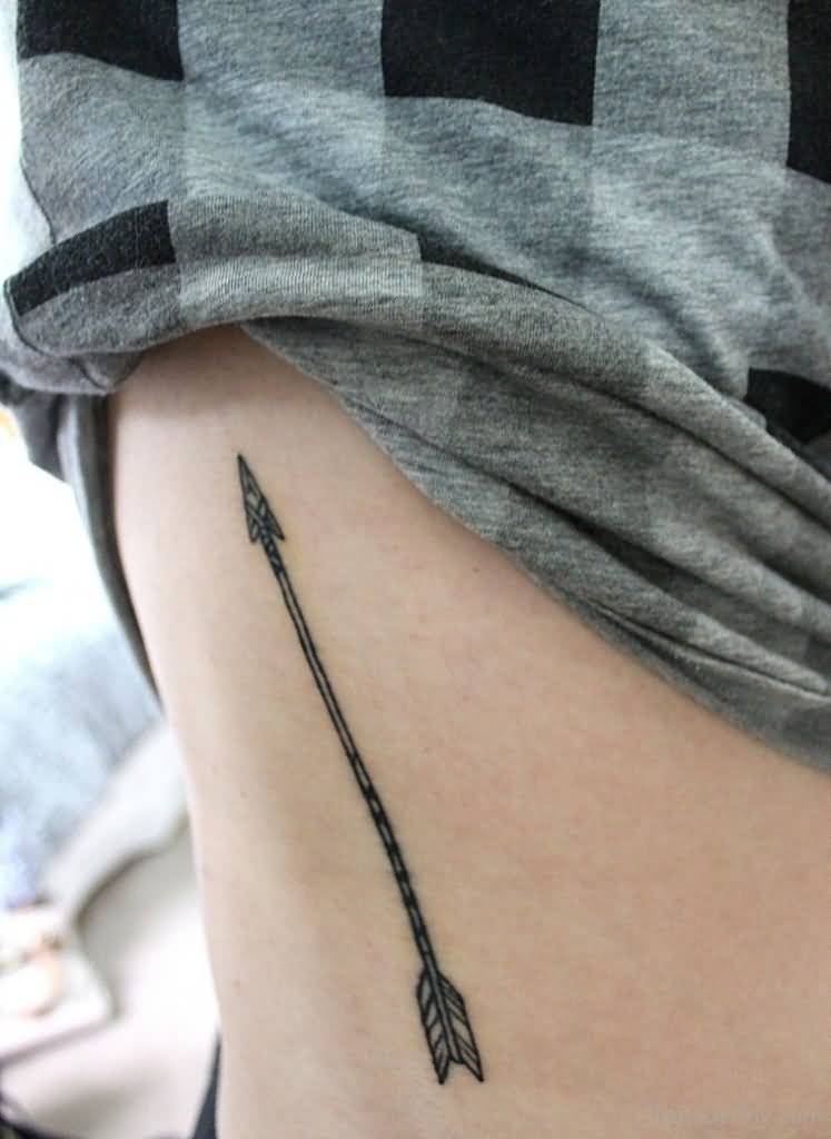 Grey Ink Arrow Tattoo On Rib
